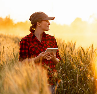 farmer in red flannel in field